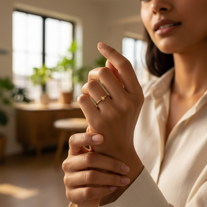 Indian woman wearing delicate gold star midi ring
